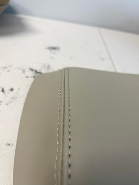 Generic Ivory Tan Leather center console armrest cover in car view shows tidy upgrade.
