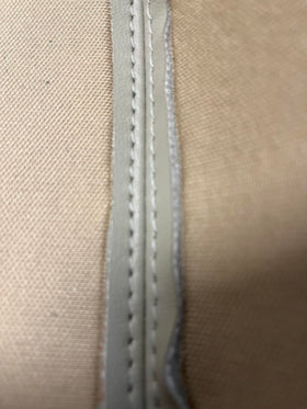 Generic Ivory Tan Leather armrest cover texture detail enhances cabin aesthetics.