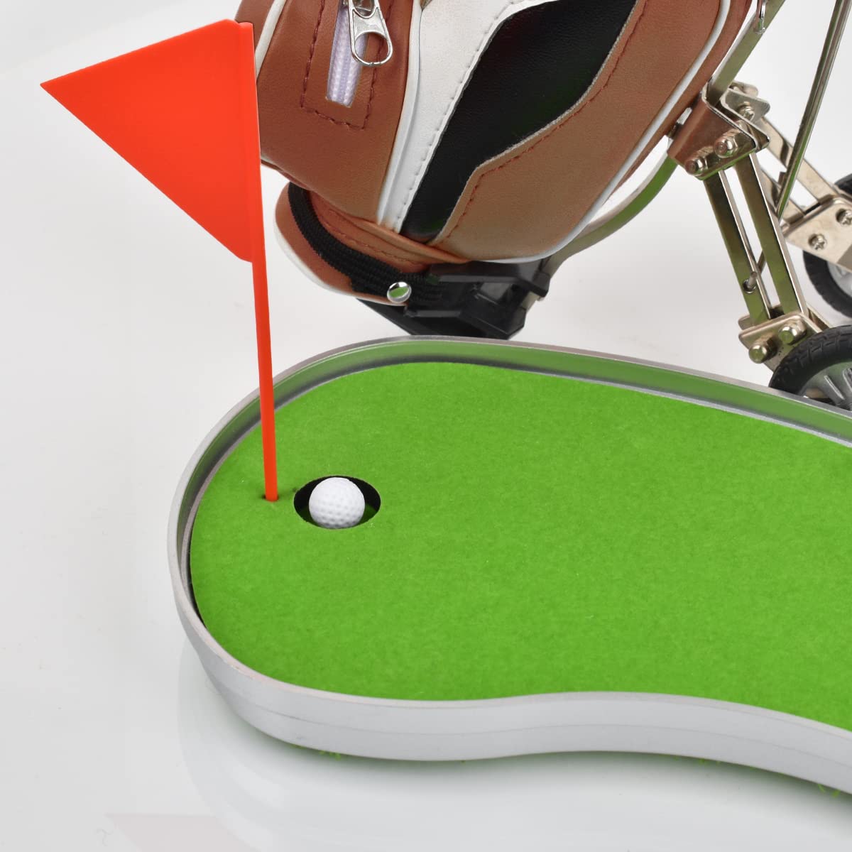 Generic mini-golf-driving-range-surface illustrates playful practice area on your desk.