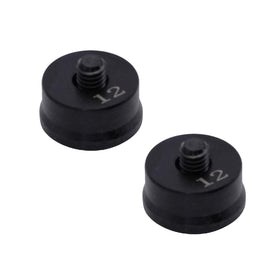 Generic weight components showing black circle and screw, highlighting replaceability and secure attachment.