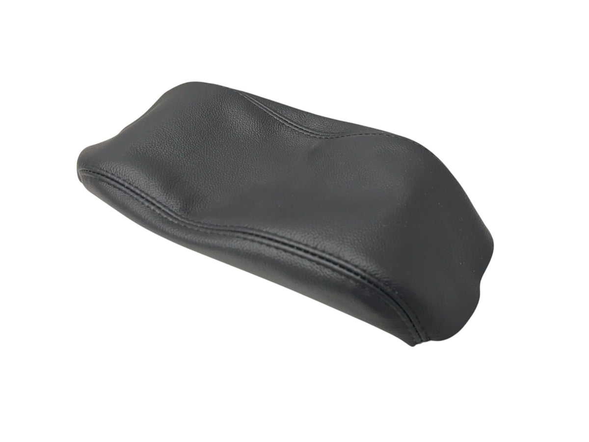 Generic Subaru Forester armrest cover in black leather for a refined interior upgrade.