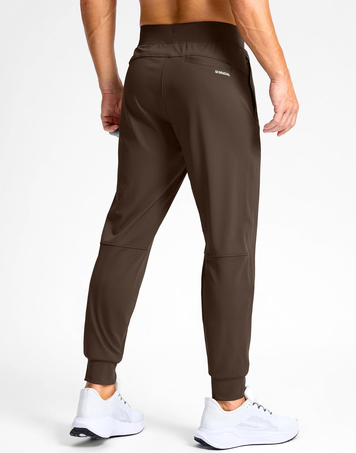 Elastic waistband with inner drawstring on G Gradual joggers for adjustable fit.