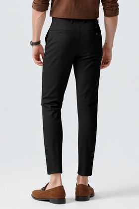 GINGTTO men's skinny dress pants in motion illustrate tapered leg versatility.