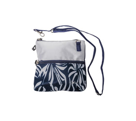 Glove It Golf Zip Bag Island Breeze clipped to a golf bag for quick access