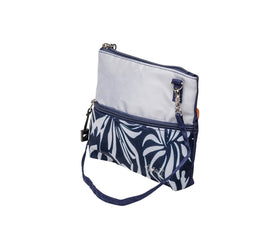 Glove It Golf Zip Bag Island Breeze shown as a crossbody for everyday carry