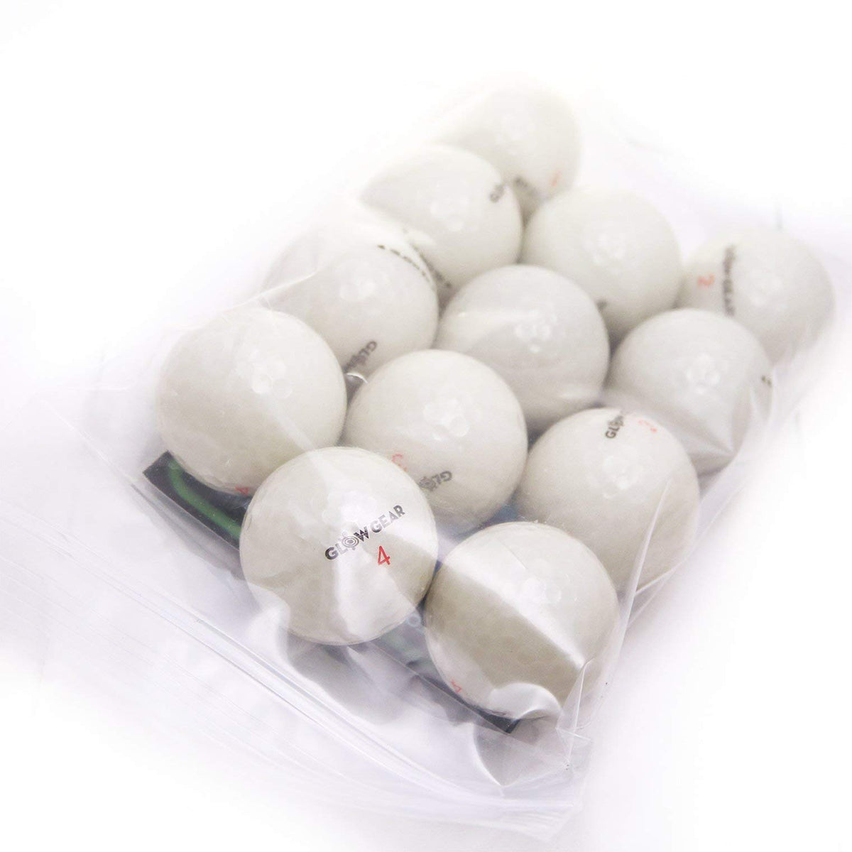 GlowV1 Night Golf Balls charging scene, UV flashlight included for quick, repeated recharge.