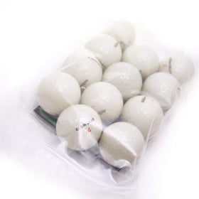 GlowV1 Night Golf Balls charging scene, UV flashlight included for quick, repeated recharge.