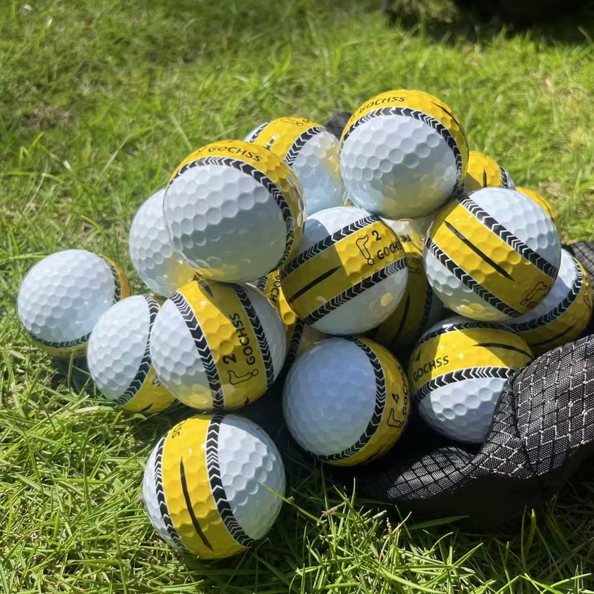 GOCHSS ball showing 332 dimples for stable flight and distance.
