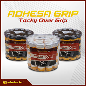 Golden Set Adhesa Grip white over-grip with gold tape detail enhances style.