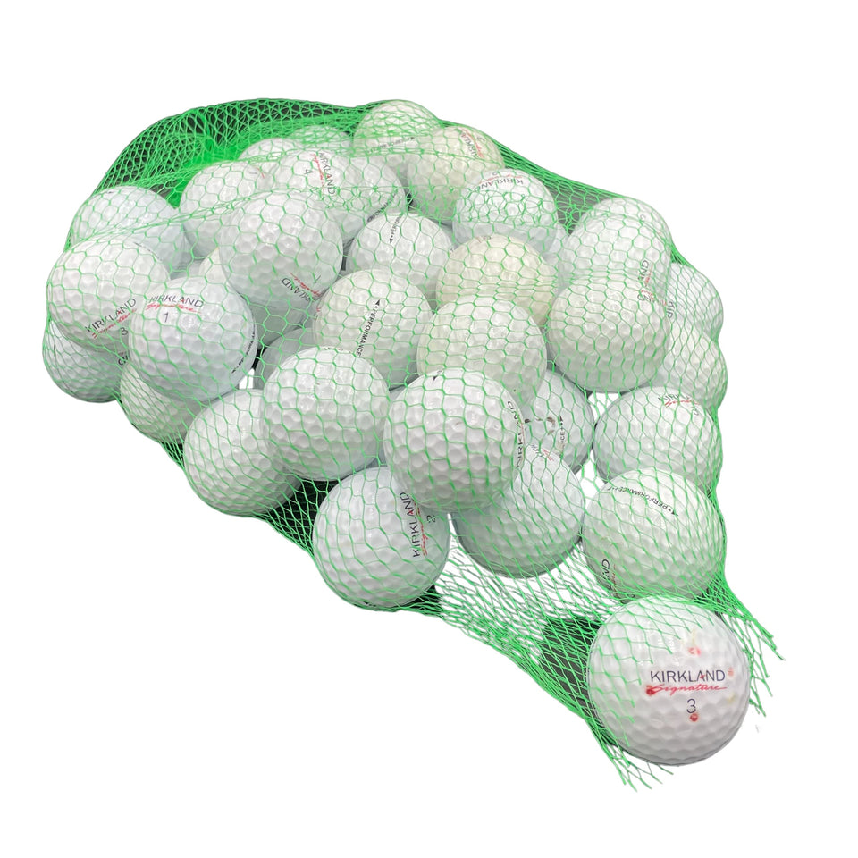Golf Ball Planet Kirkland Signature 3A ball on white surface, ideal for practice.