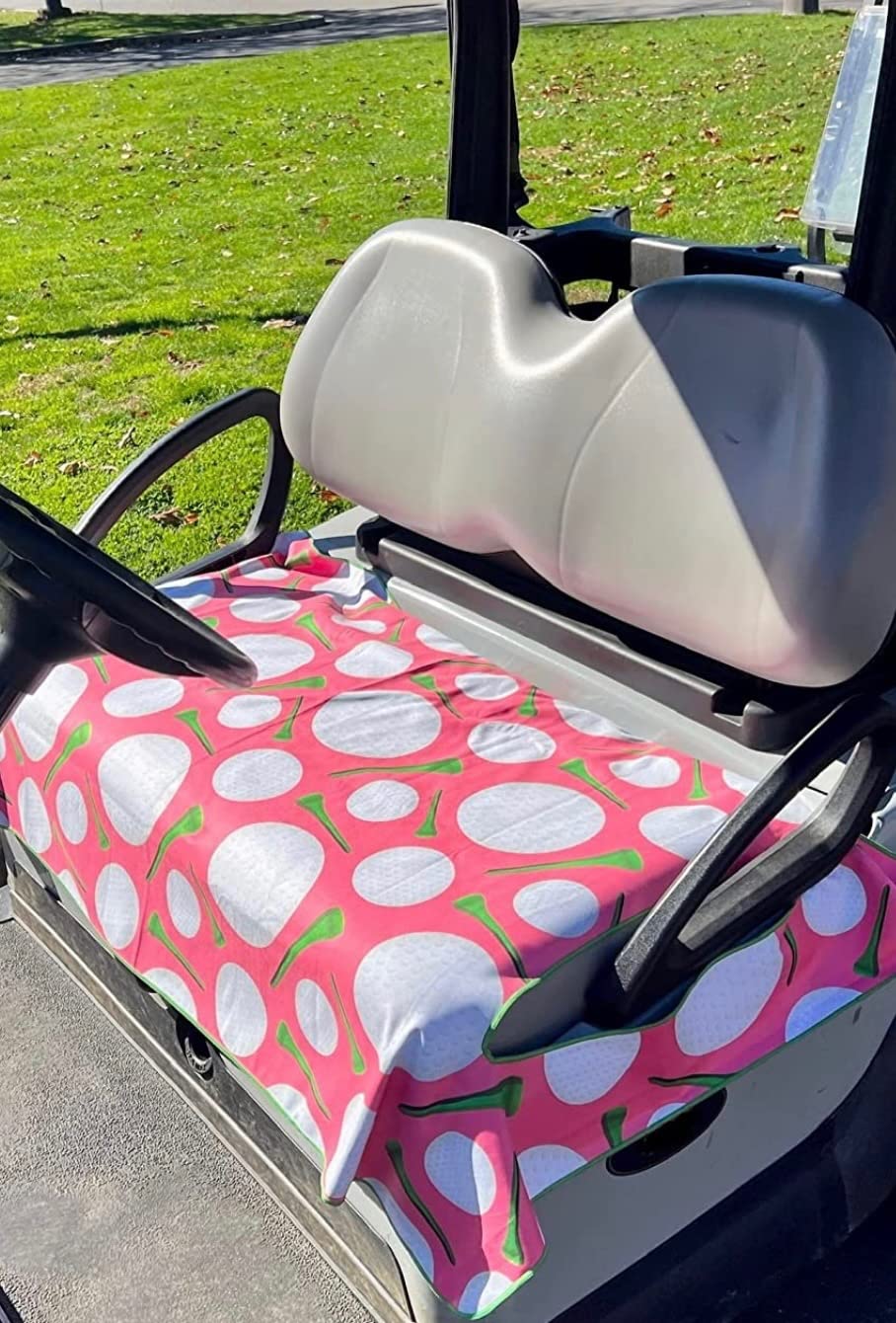 Golf Cart Essentials seat cover in pink golf ball design adds comfort on sunny rides