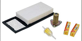Golf Cart King EZGO TXT tune-up kit components ready for installation to improve engine performance.