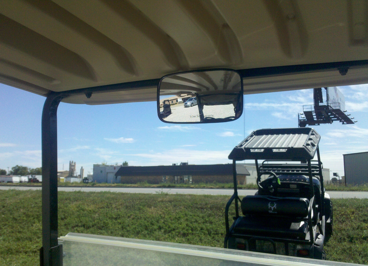 Rear view mirror features a black plastic backing for durable daily use.