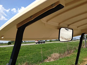 Metal bracket detail on golf cart rear view mirror showing sturdy attachment.
