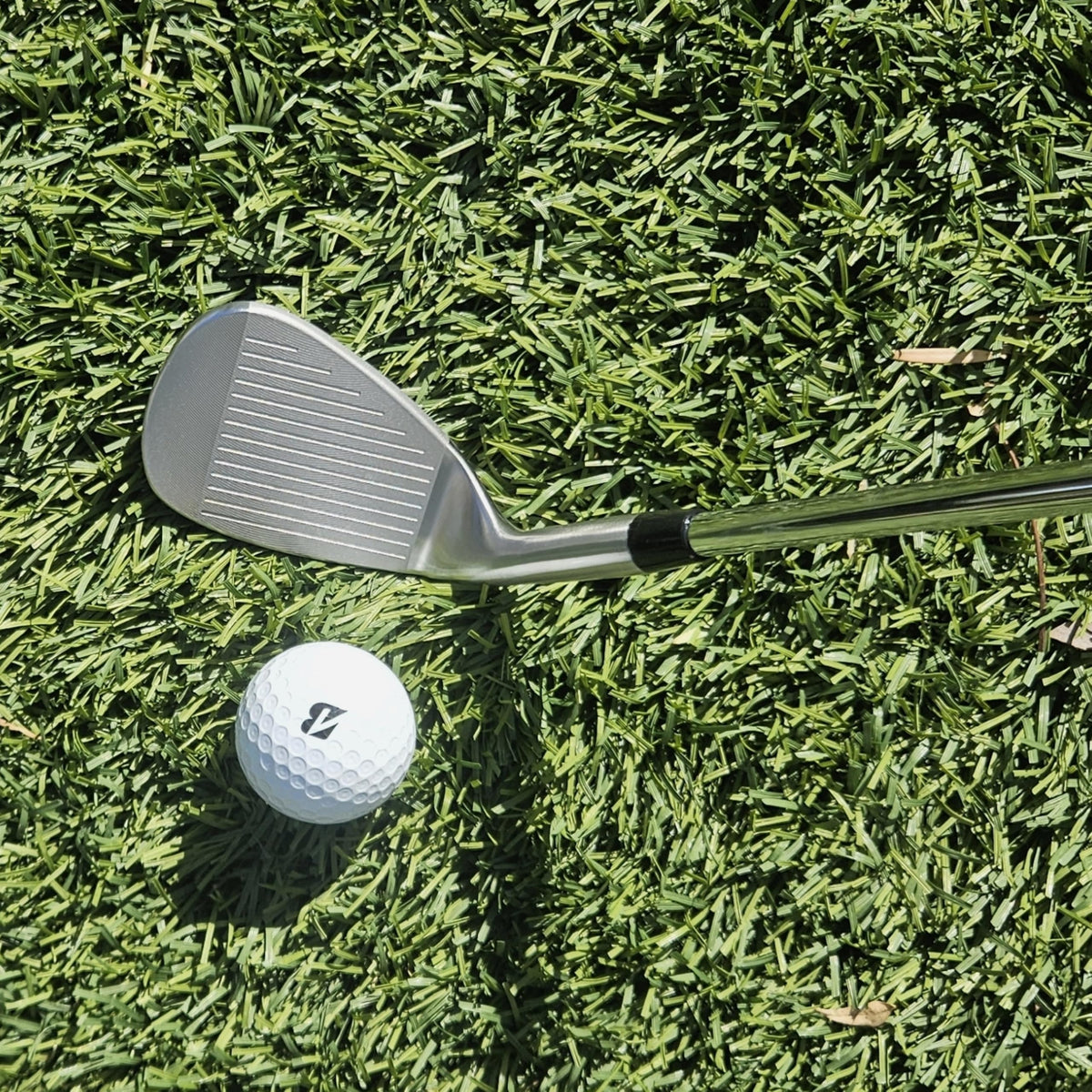 Golf Era wedge sand shot setup demonstrating bunker versatility