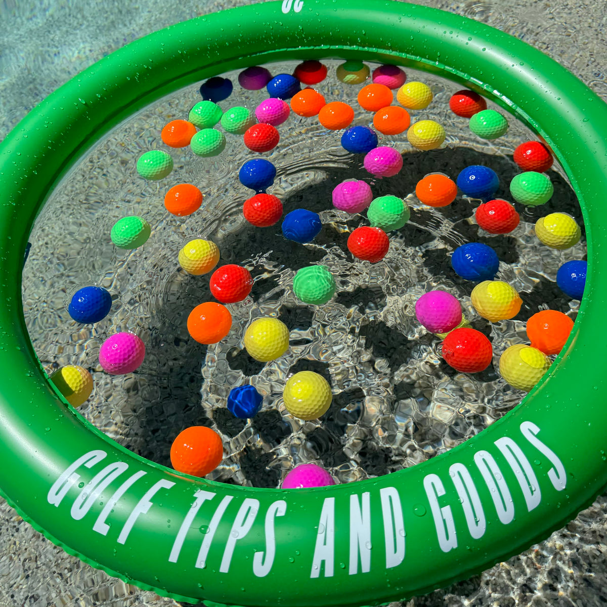 Golf Tips and Goods floating ball orange boosts poolside practice fun