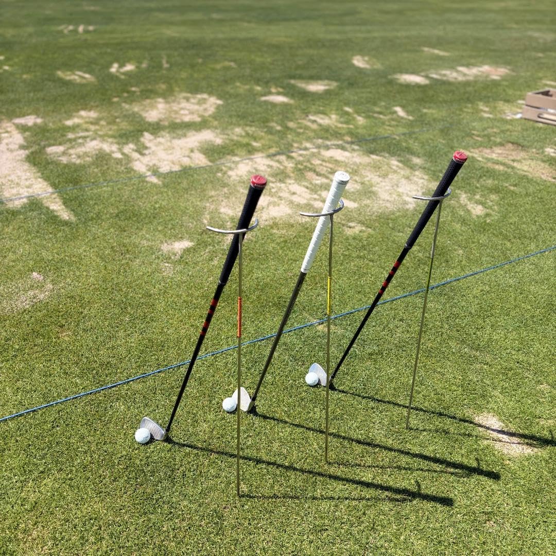 GolfClubSpike in USA-made stainless steel stand keeps clubs visible on the tee