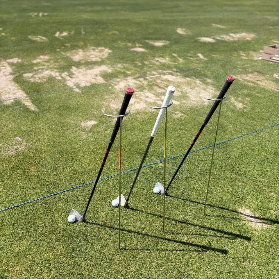 GolfClubSpike in USA-made stainless steel stand keeps clubs visible on the tee