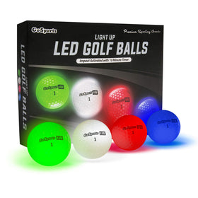 GoSports LED golf balls in use during a dark evening session.