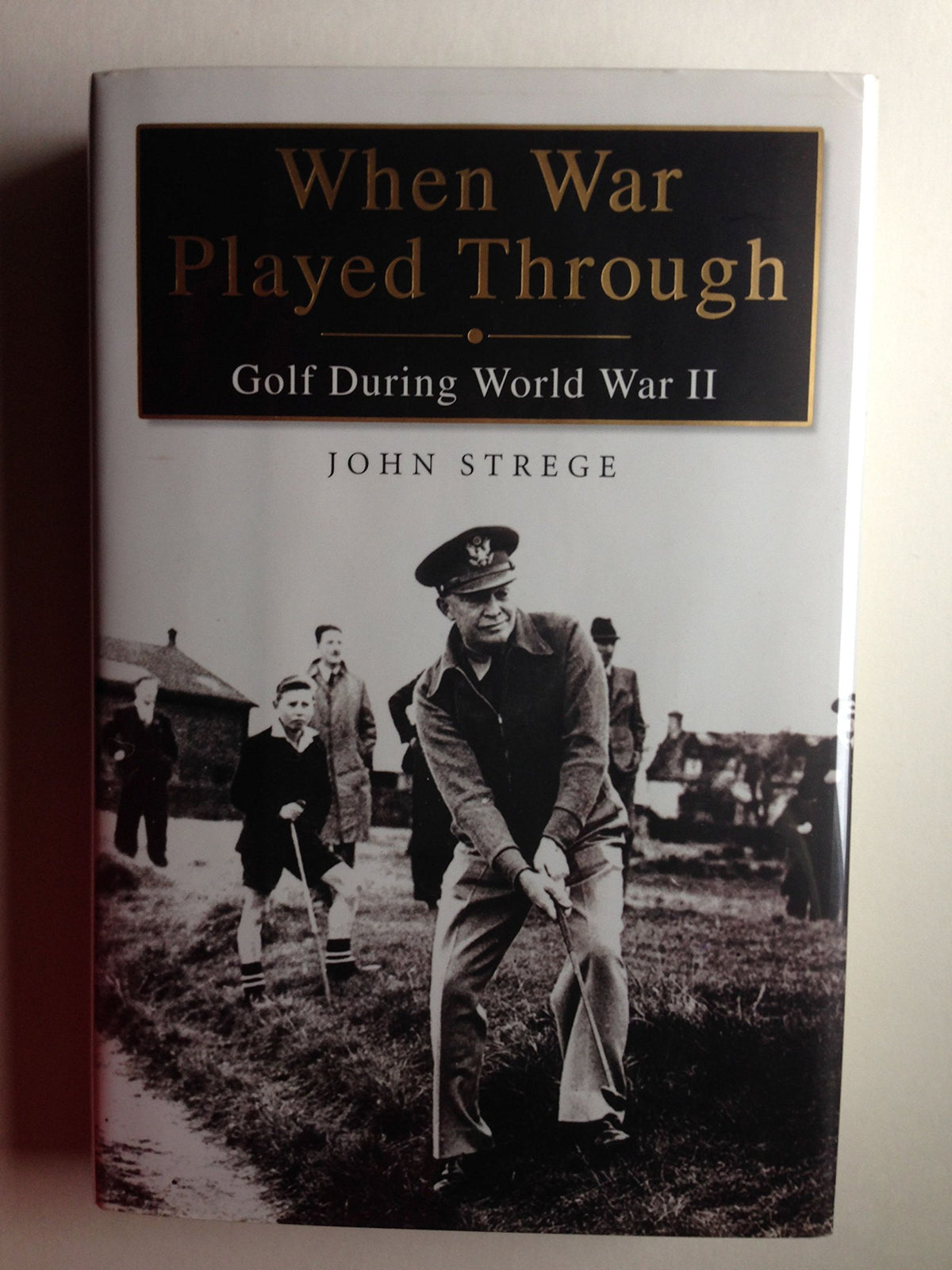 Gotham Books' When War Played Through cover, ideal for history buffs and golf fans.