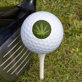 GRAPHICS & MORE marijuana leaf design on Wilson golf ball enhances visibility on bright fairways.
