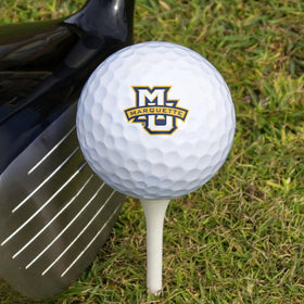 GRAPHICS & MORE Marquette Wilson golf balls showcasing team spirit on course.