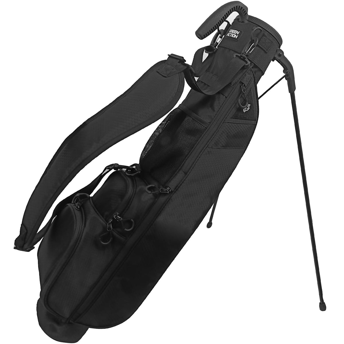 Green Action Sunday Golf Bag with stand deployed for stable setup on uneven turf.