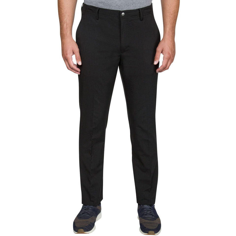 Greg Norman black pants front view with slim athletic fit for active wear.