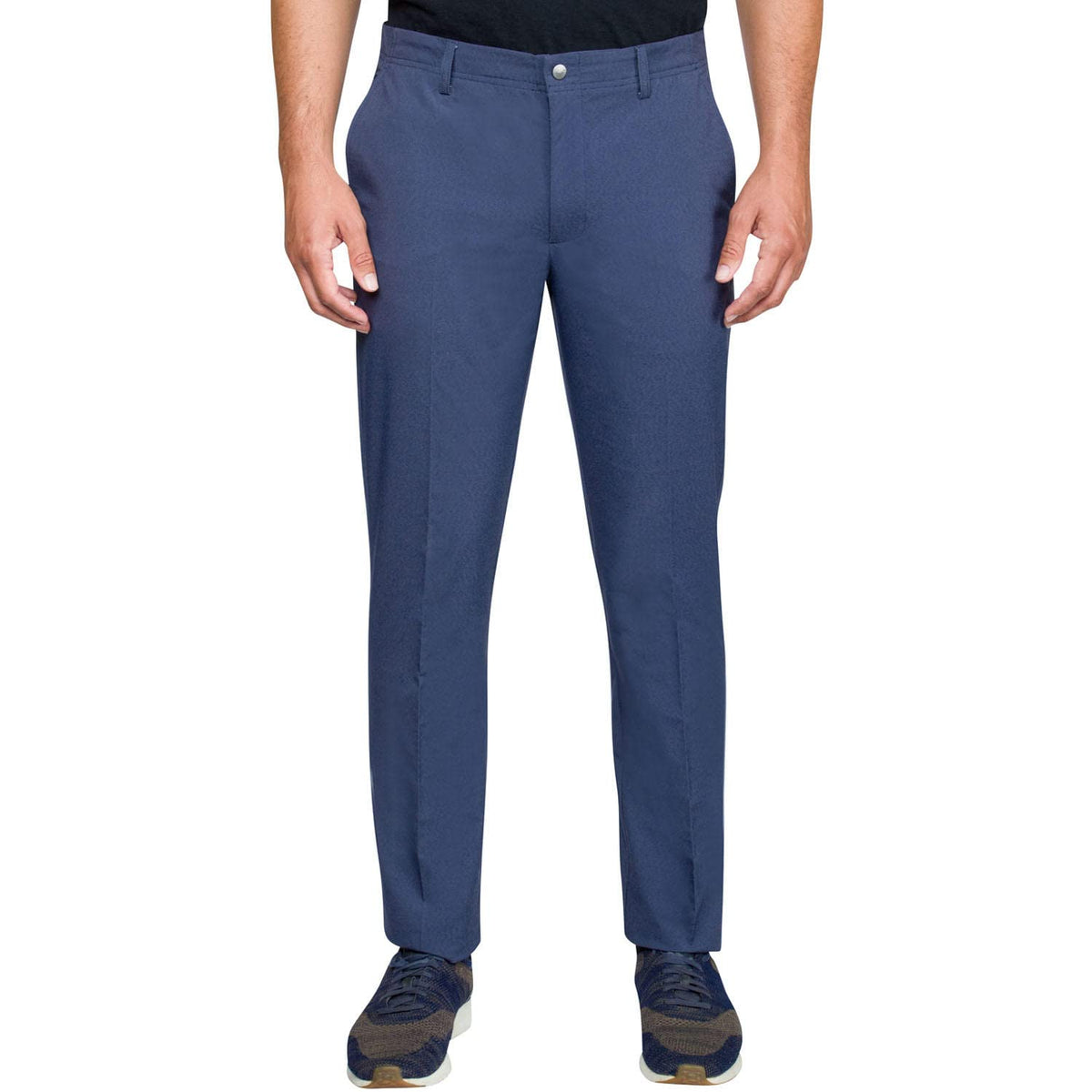 Greg Norman blue golf pants model wearing for on-course comfort and style