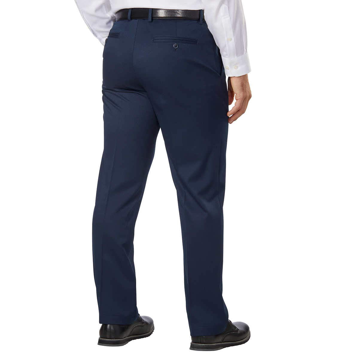 Greg Norman Men's Ultimate Classic Travel Pant blue back view showcases versatile day-to-night wear.