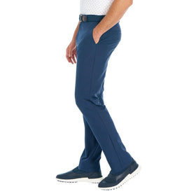 Greg Norman ML75 chino pant blue side stretch demonstrates flexibility for movement during daily activities