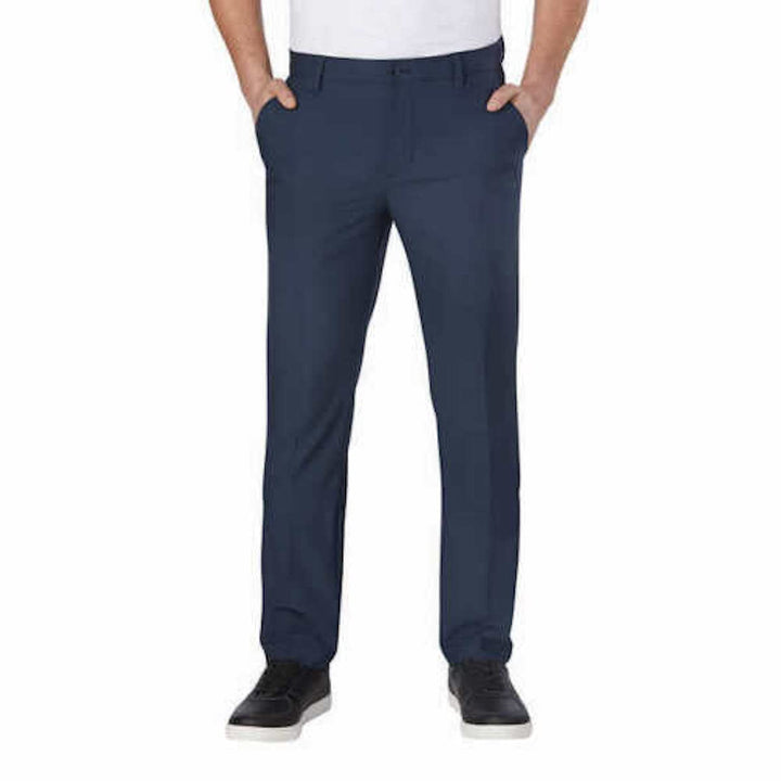Greg Norman ML75 Pant front view, navy, versatile for golf and casual wear.