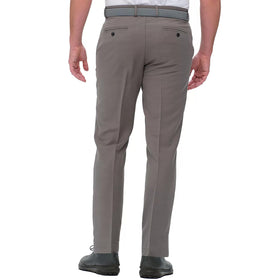 Greg Norman shark logo back pocket detail signaling heritage.