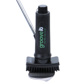 Close-up of Grooveit bristles scrubbing clubface grooves
