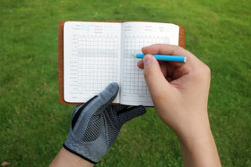Handy Picks elastic closure demonstrates quick setup and refill on the green.