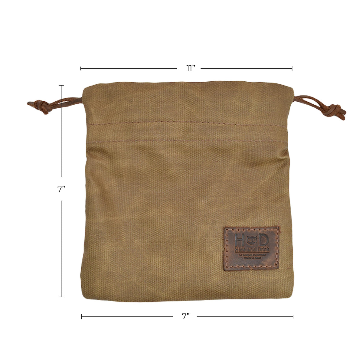 Close-up of leather cinch securing tees and balls in Hide & Drink pouch