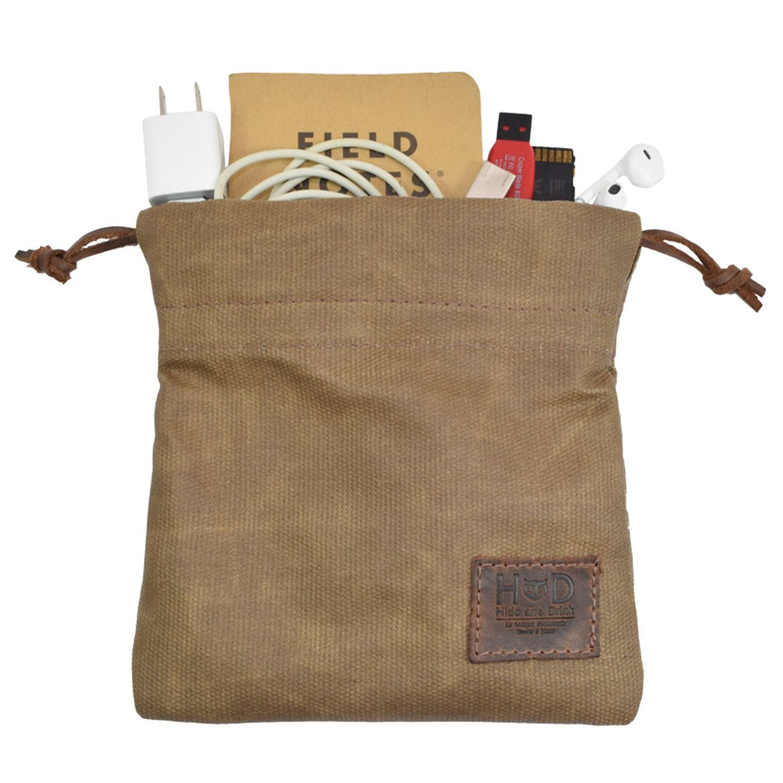 Patina develops over time on Hide & Drink waxed canvas field pouch
