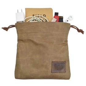 Patina develops over time on Hide & Drink waxed canvas field pouch