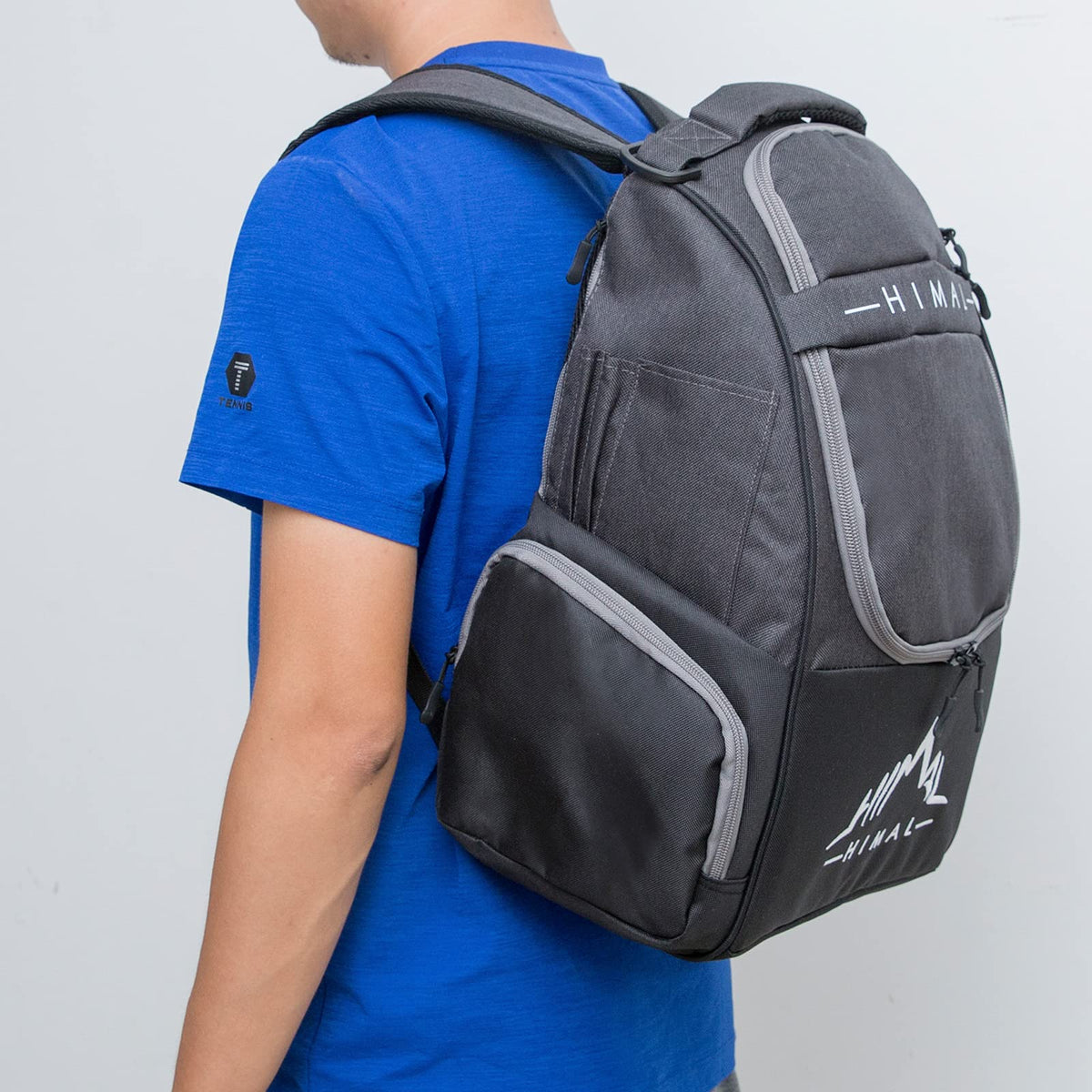 Himal Outdoors HIMAL bag upper compartment stores extra discs or clothing for flexible play.