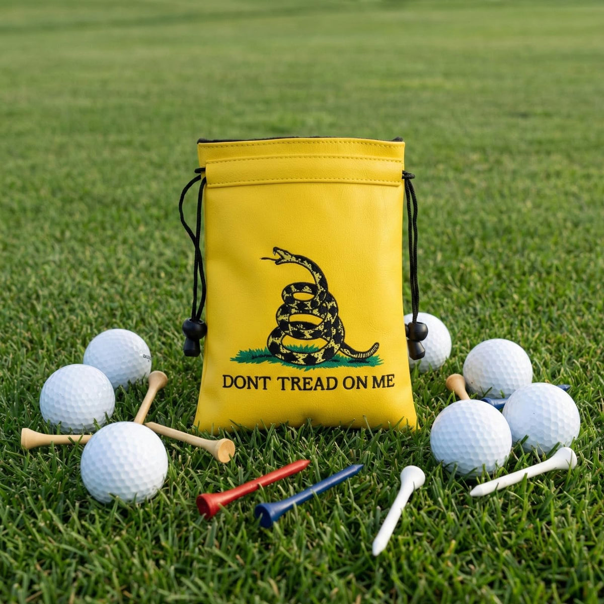 Hooked On Golf ball and tee pouch interior showing organized storage.