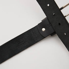Huckberry Flint and Tinder 365 belt closeup leather detail with durable brass hardware