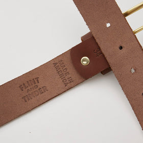 Huckberry Flint and Tinder 365 Belt brass hardware close-up for lasting durability.
