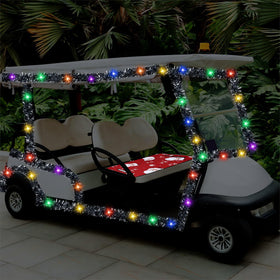 HunnmingRe golf cart holiday transformation with red seat cover and silver garland
