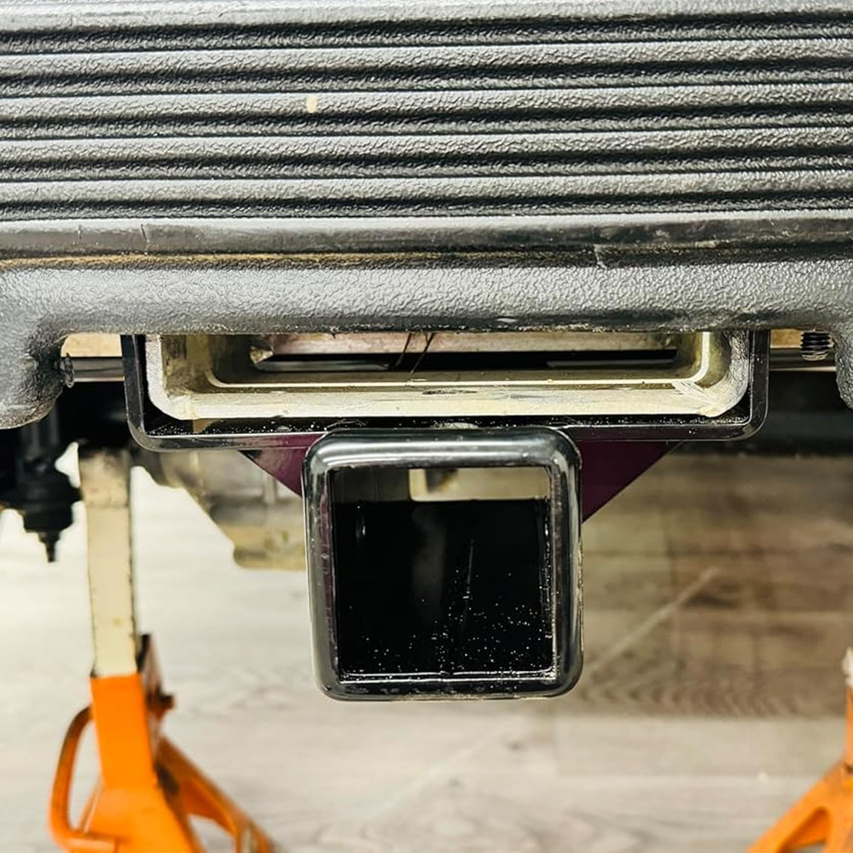 Huskey two-receiver hitch accepts trailer balls of any size for versatile towing