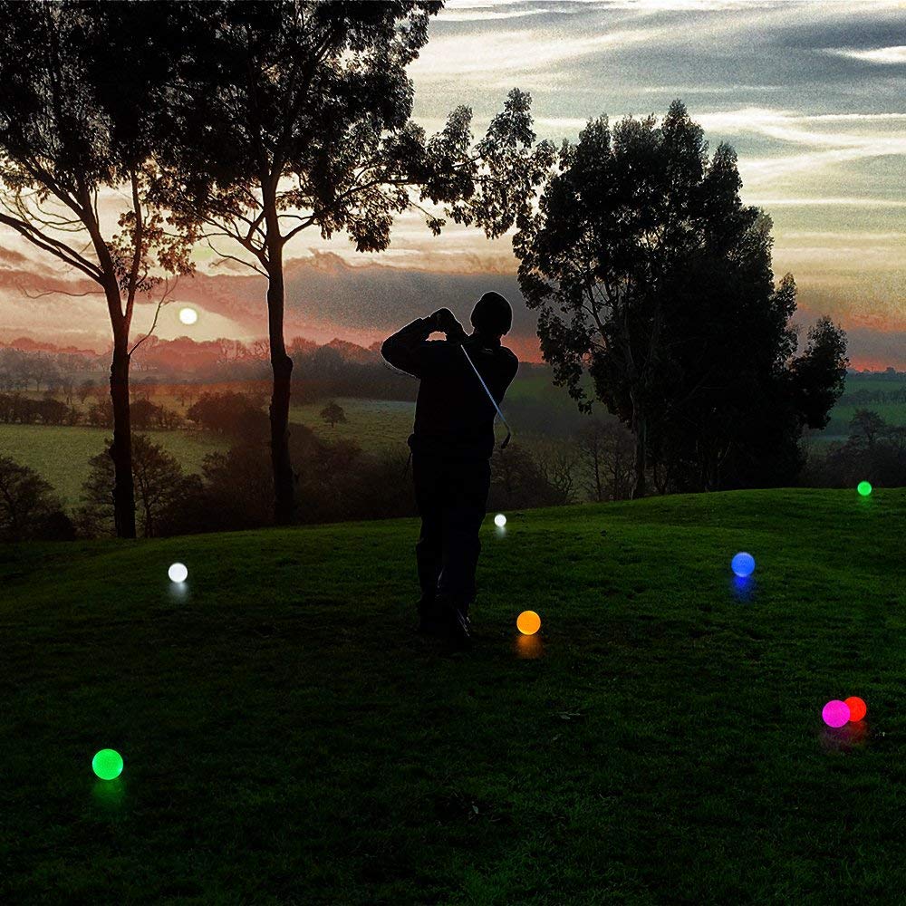 ILYSPORT glow golf ball stands out on the course at dusk.