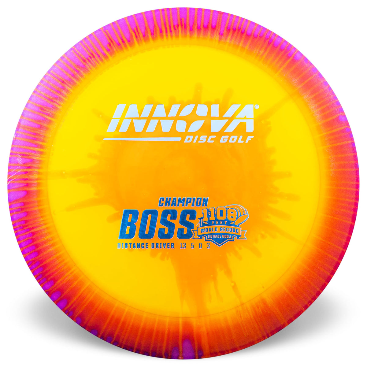 Innova Boss I-Dye Champion disc on the field shows stable flight suitable for sidearm throws.