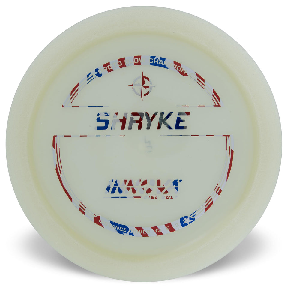 Innova Proto Glow Shryke disc glowing at dusk for long-distance throws