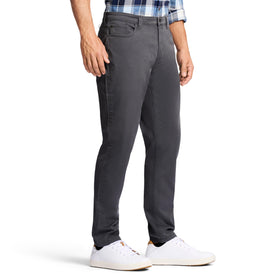 IZOD SwingFlex pants peacoat back pocket detail for everyday practicality.