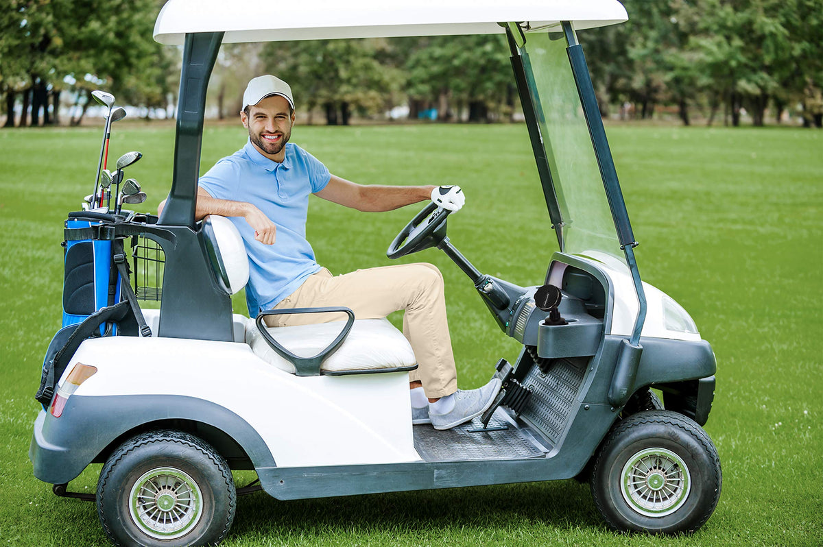 JEF World of Golf portable Bluetooth speaker mounted on cart handle for hands-free music on the course