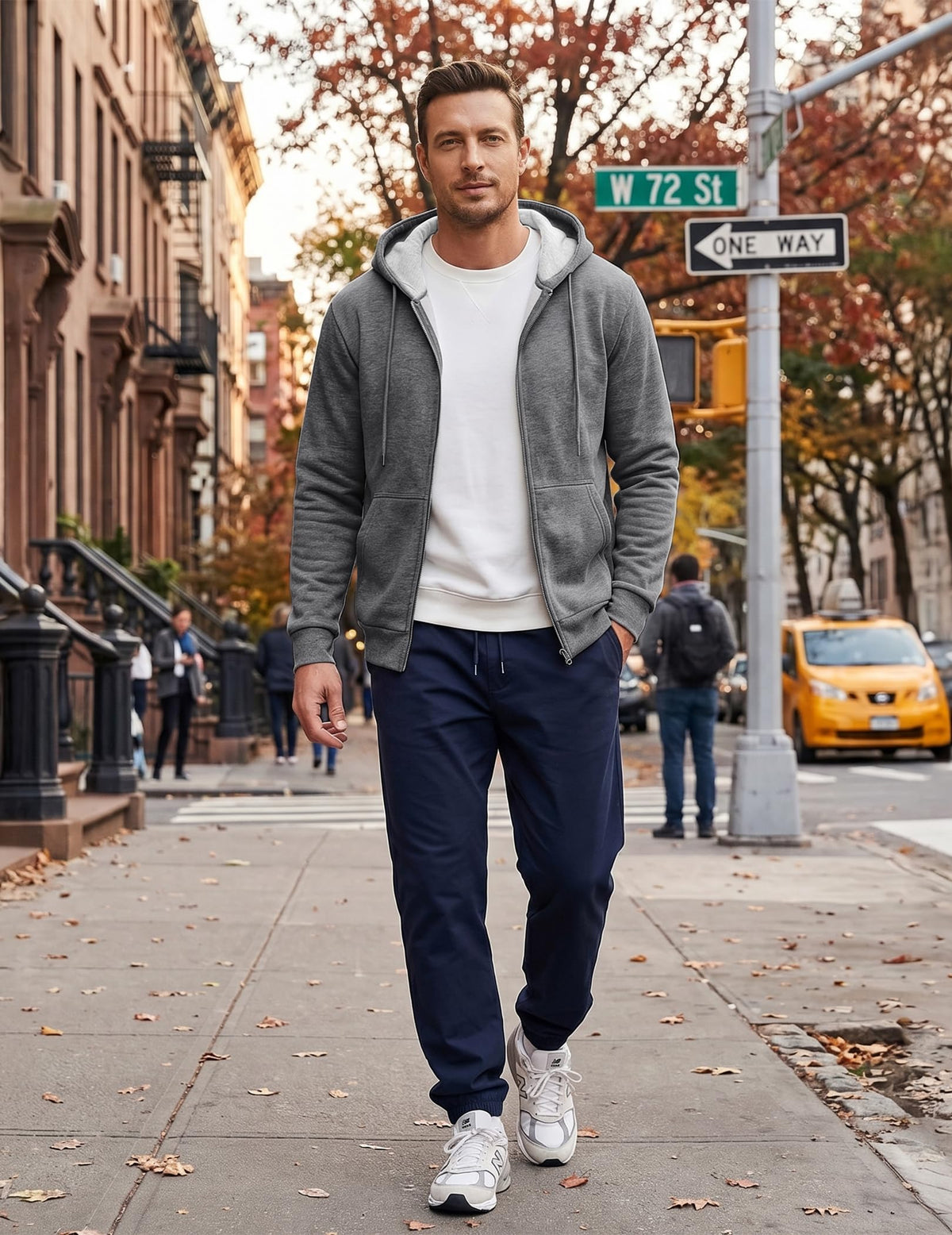 JMIERR grey side view hoodie highlighting relaxed fit.